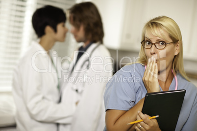 Alarmed Medical Woman Witnesses Colleagues Inner Office Romance.