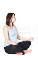 Portrait of pretty pregnant woman practicing yoga