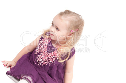 Studio shot of baby girl in gala dress