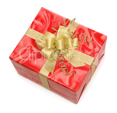 Rote Geschenkpackung mit goldener Schleife