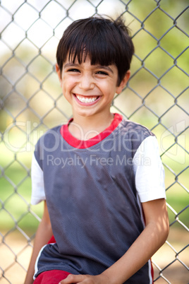 Close up shot of a happy boy laughing