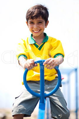 Young kid enjoying swing ride