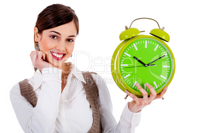 lady holding alarm clock
