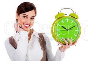 lady holding alarm clock