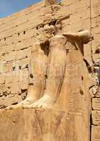 damaged Egyptian statue