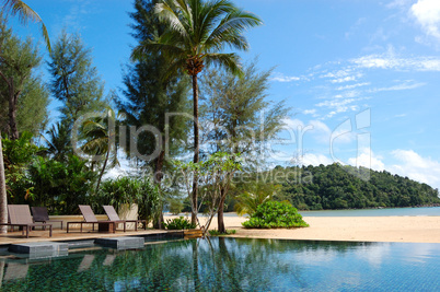 Swimming pool at the beach of luxury hotel, Phuket, Thailand