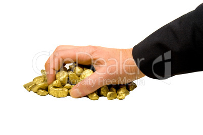 Hand greift nach Gold
