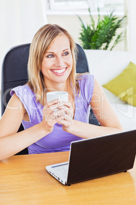 woman with a glass and laptop