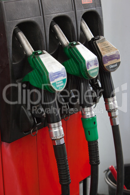Gasoline pumps nozzles at petrol station