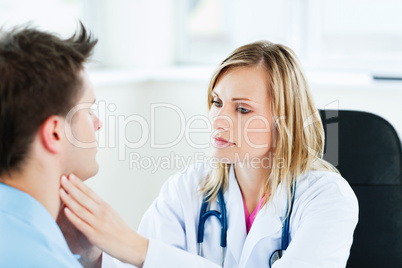 Doctor examinating her male patient