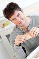 man eating bread