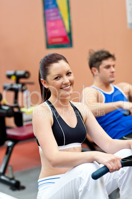 woman and boyfriend in a fitness center