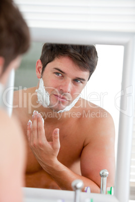 young man putting some shaving