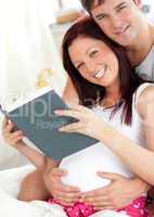 parents reading a book
