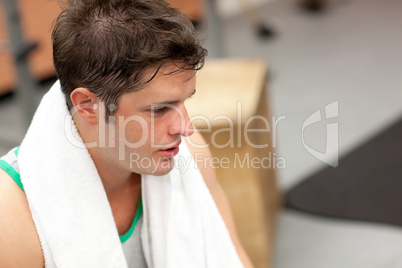 man with towel around the neck