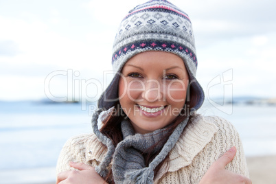 woman is cold and wearing a hat