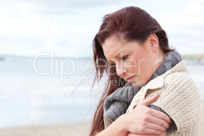 Young smilng female over sea background