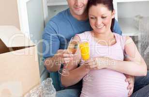 couple celebrating pregnancy