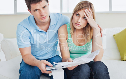 couple after calculating bills