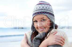 Young smilng female wearnig hat