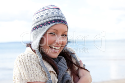 woman is cold and wearing a hat