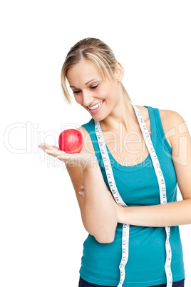woman with red apple and measure tape
