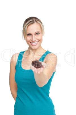 Smilng woman offering chocolates