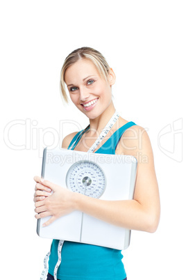 woman holding a weight scale