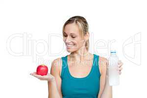 Woman with apple and water