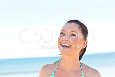 Young pretty woman on the beach