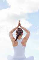 Caucasian woman practising yoga