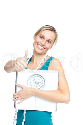 woman holding a weight scale
