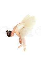 Ballet dancer tighten her dancing shoes