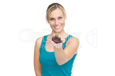 woman showing chocolate bar to the camera