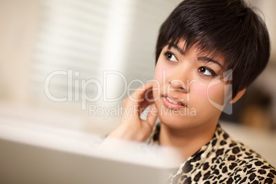 Pretty Smiling Multiethnic Woman Using Laptop