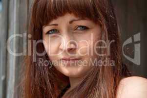 Portrait of beauty red-haired girl.