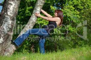 Young woman with tree.