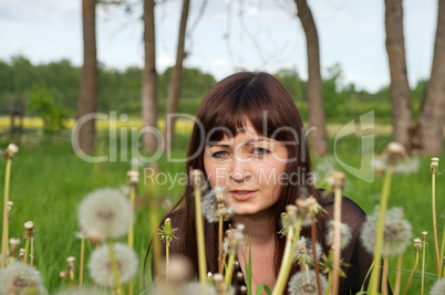 Beauty girl in meadow.