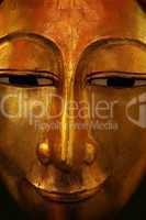 Goldene Maske mit Buddha Gesicht