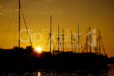 yachts sunset silhouettes