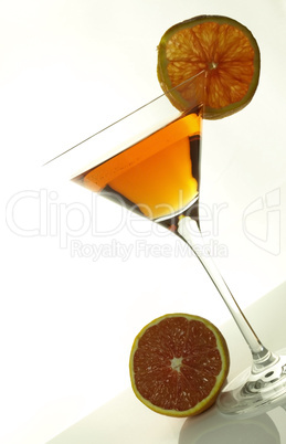 Orange cocktail on white background