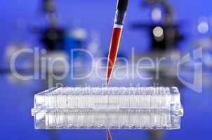 Pipette & Cell Tray in a Scientific Research Laboratory