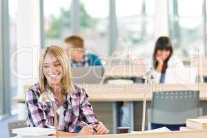 Happy smiling student study in classroom