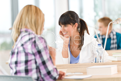 Three high school students in classroom