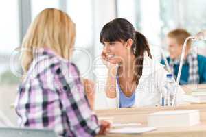 Three high school students in classroom