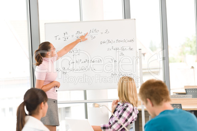 High school students with professor in classroom