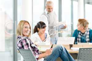 High school - three students in classroom