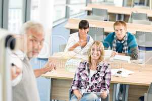 High school - three students with mature professor