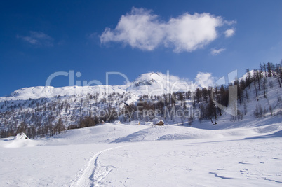 snowy alpine lake and village