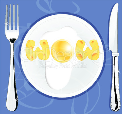 wow text made of cheese and egg on plate